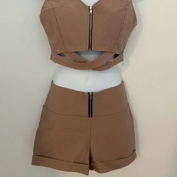 Mauve colored top and shorts.
Stretchy - Picture 2 of 12